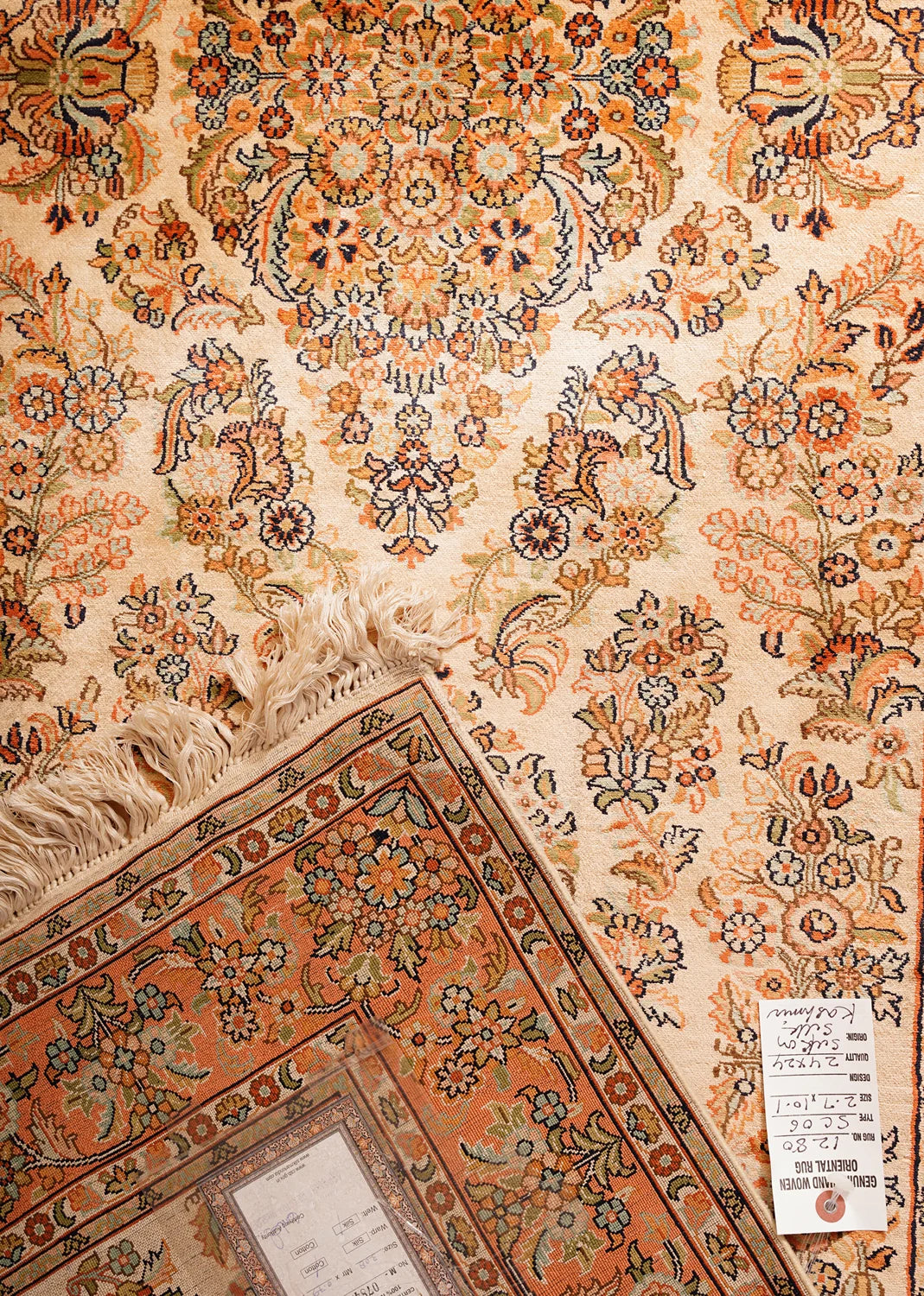 Intricate Floral Medallion Rug with Earthy Tones and Oval Medallion