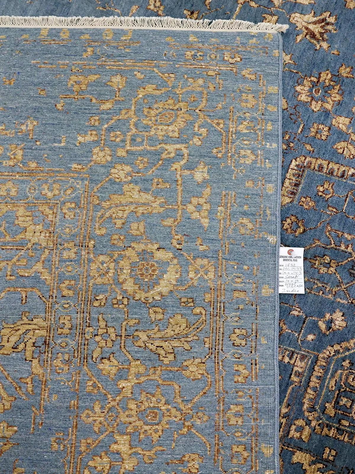 Vintage-Inspired Blue and Beige Rug with Fringes