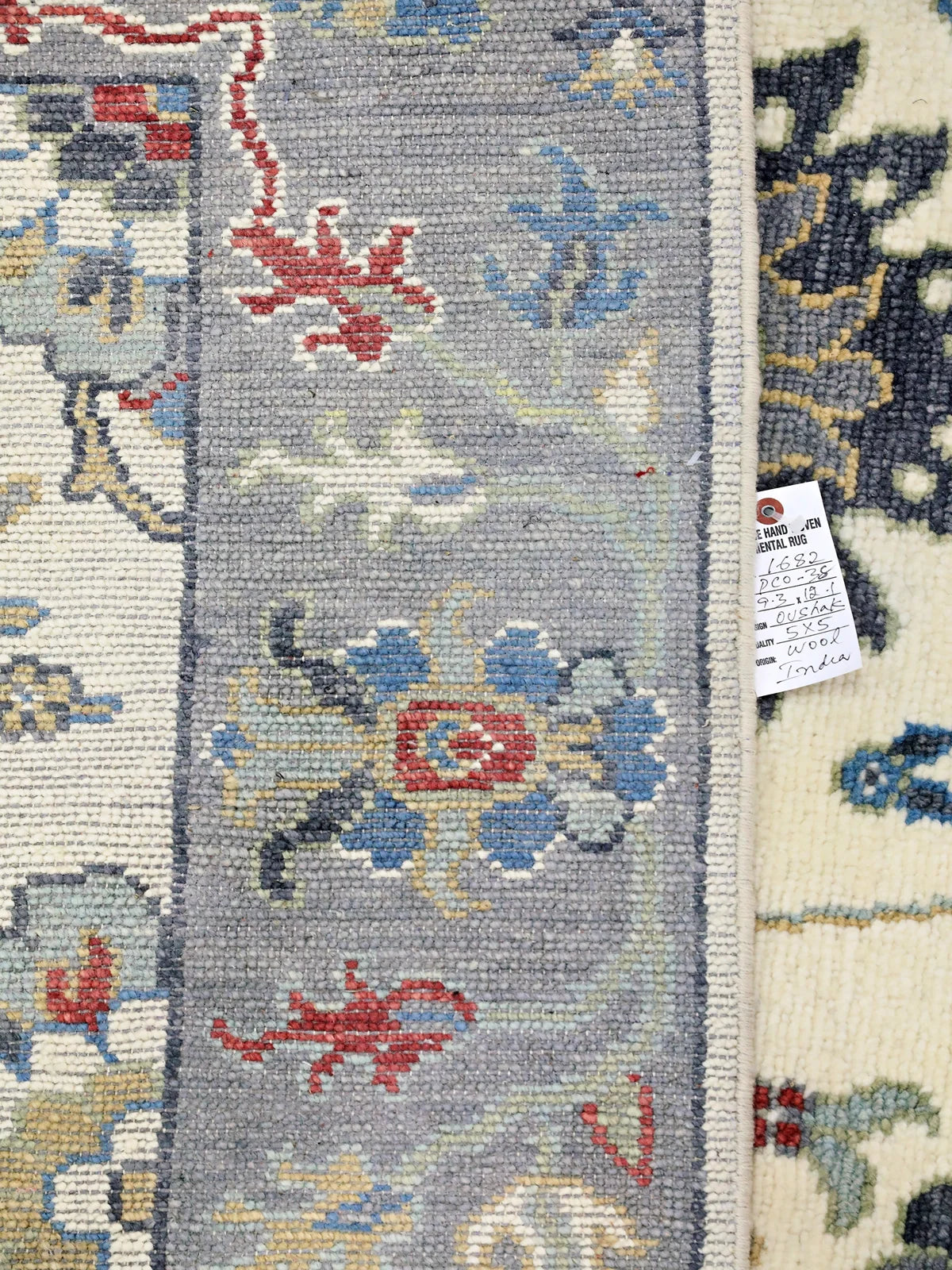Handmade White Oushak Rug with Vibrant Florals